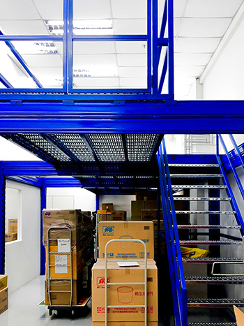Installing mezzanine on Ubi Singapore project - Racknsave Racking Solutions.