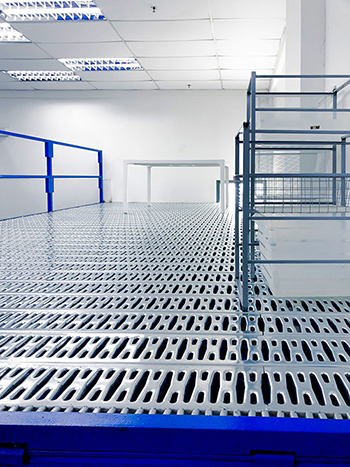 Installing mezzanine on Ubi Singapore project - Racknsave Racking Solutions.
