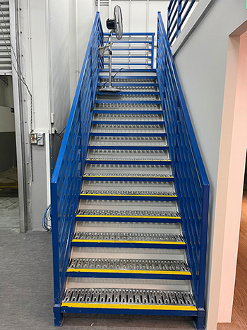 Installing mezzanine on Woodlands Singapore project - Racknsave Racking Solutions.