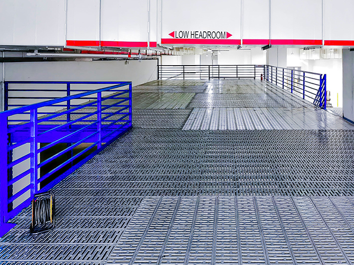 Installing mezzanine on Tuas Singapore project - Racknsave Racking Solutions.